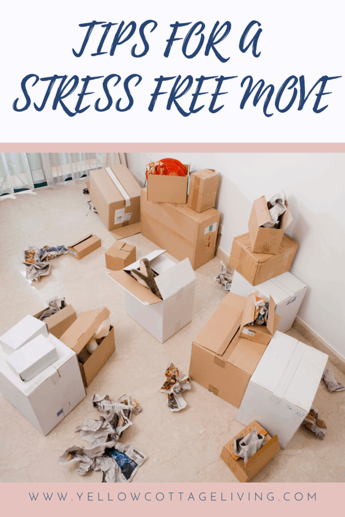 move organization tips picture of a room full of cardboard and white boxes that are being packed to move from one location to another.