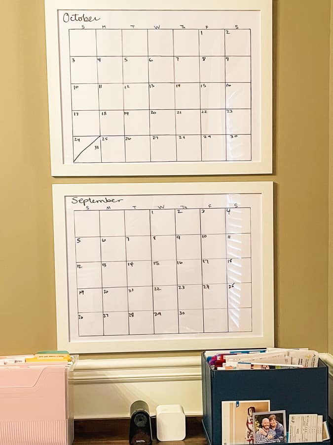 two large wall calendars with white frames on beige wall DIY wall calendar