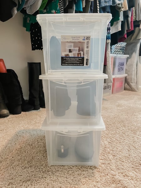 shoe storage with 3 clear bins stacked containing shoes