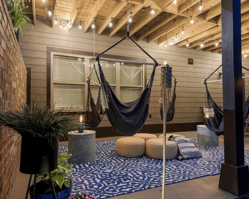 Covered porch decorating ideas grey hammock swing chairs with blue and white rug